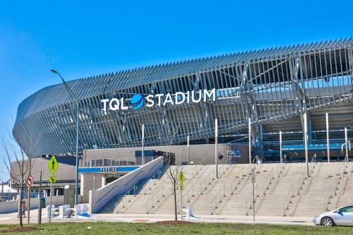 a large soccer stadium with a car parked in front at **NEW RADiant Stay in the Thrust of OTR* w/Parking in Cincinnati