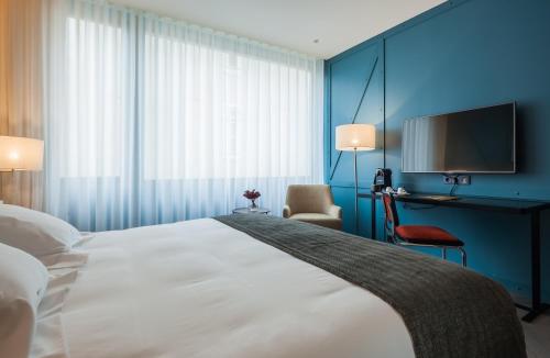 Letto o letti in una camera di Vincci Porto
