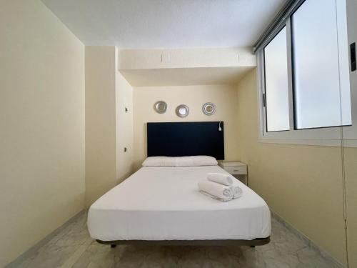 Posteľ alebo postele v izbe v ubytovaní MAGNIFICENT MEDITERRANEO APARTMENT