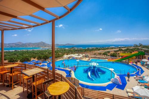 a view of a pool at a water park at Elounda Water Park Residence Hotel in Elounda