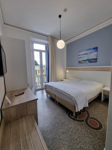 Postel nebo postele na pokoji v ubytování Hotel Canali, Portofino Coast