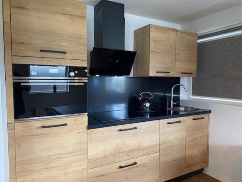 Dapur atau dapur kecil di Ballumerhoeve Fleuri lodge