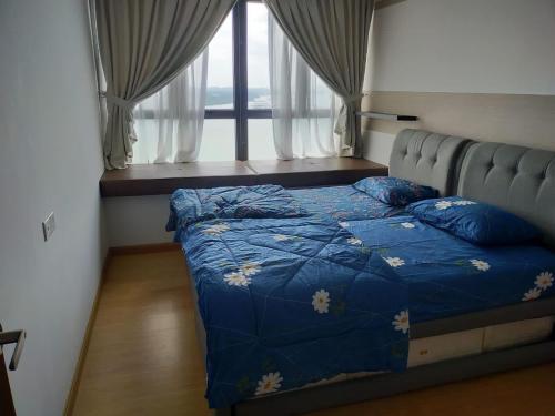 Katil atau katil-katil dalam bilik di Royal Strand Danga Bay Abang Payung