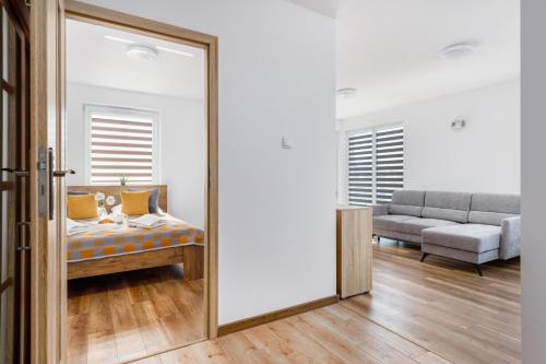 Katil atau katil-katil dalam bilik di Coast Breeze Apartment by Renters