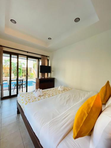 Ένα ή περισσότερα κρεβάτια σε δωμάτιο στο Meewaya Hotel