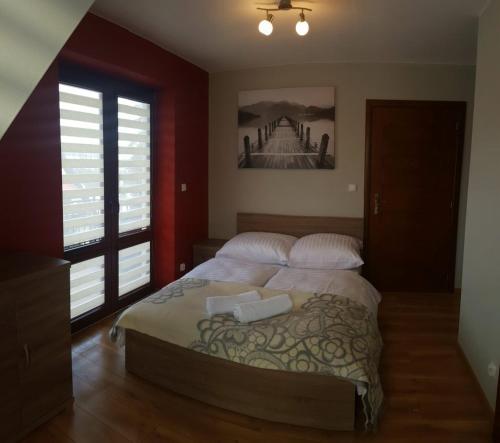 Ένα ή περισσότερα κρεβάτια σε δωμάτιο στο Villa TATRIA