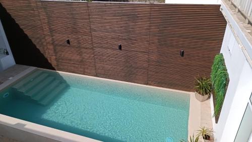 a swimming pool with at Casa do Penedo in Vila Franca do Campo