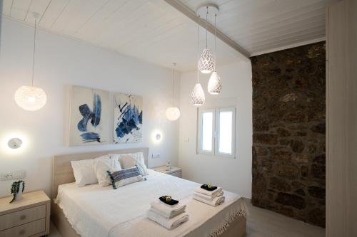 Posteľ alebo postele v izbe v ubytovaní TIFFANYS VILLAS