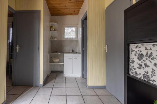 a bathroom with a sink and a toilet in a room at Domaine de bois joli in Buis-les-Baronnies