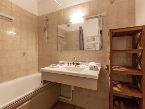 a bathroom with a sink and a bath tub at Studio de standing calme à Val-d'Isère, proche du centre, sans WIFI ni parking - FR-1-694-288 in Val dʼIsère