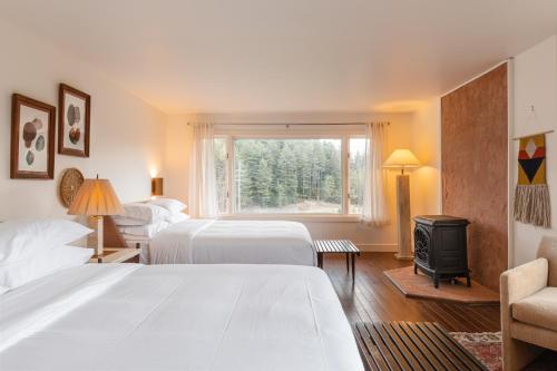 Postel nebo postele na pokoji v ubytování Eastwind Hotel Lake Placid