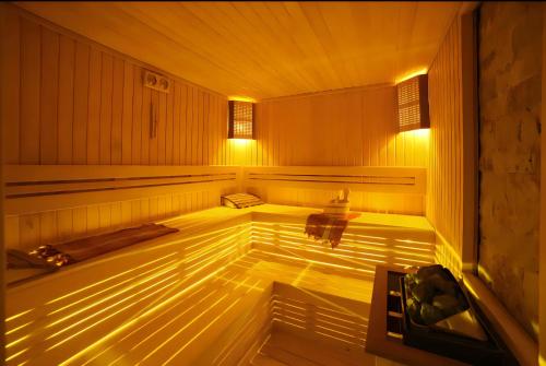 an empty sauna with lights on the inside of it at Luxury Residence in Şişli (Pool/Garage/Gym) in Istanbul
