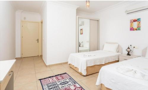 Ένα ή περισσότερα κρεβάτια σε δωμάτιο στο Villa Canberk