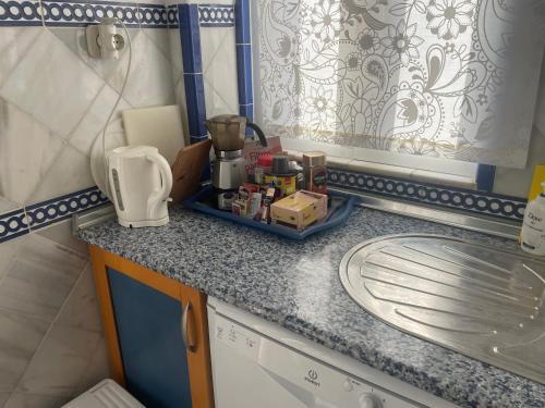 Kuchyň nebo kuchyňský kout v ubytování Apartamentos Puerto Sherry