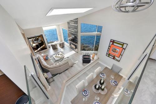an overhead view of a living room with the ocean at Harbourfront Executive Stay in Victoria