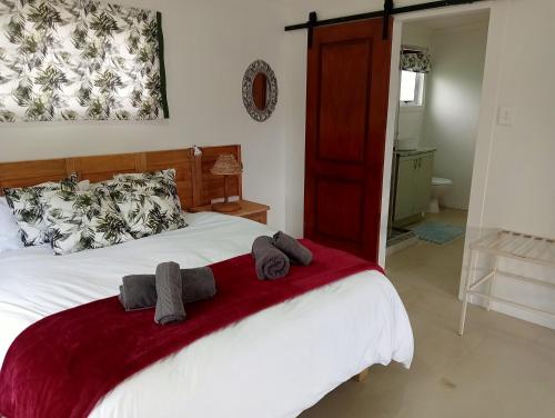 Ένα ή περισσότερα κρεβάτια σε δωμάτιο στο Makarios Guest Farm