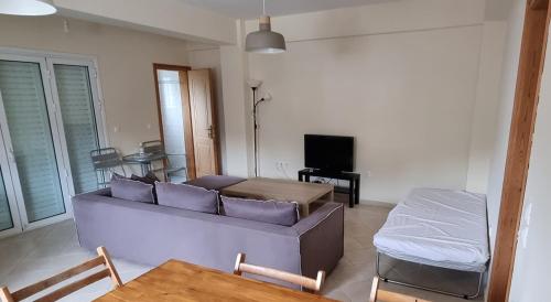 Ένα ή περισσότερα κρεβάτια σε δωμάτιο στο Eva's apartments