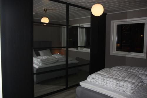 Llit o llits en una habitació de Exclusive Apartment