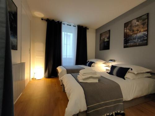Katil atau katil-katil dalam bilik di La Timonerie- Vue mer/Plage/Port