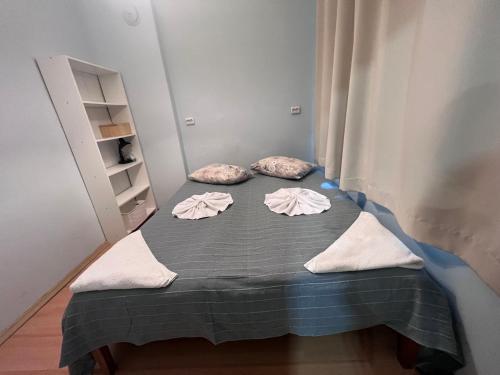 A bed or beds in a room at Apartment Saborni