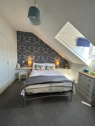 Ein Bett oder Betten in einem Zimmer der Unterkunft Archway Guest House