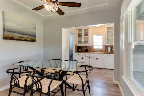 a dining room with a glass table and chairs at San Fernando Pool home + Large Private Guest House in San Fernando
