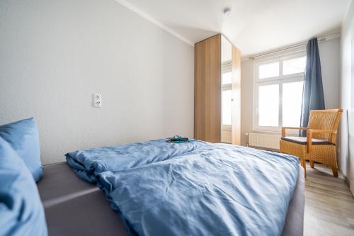 Ένα ή περισσότερα κρεβάτια σε δωμάτιο στο Haus Ferienglück Sauna im Haus