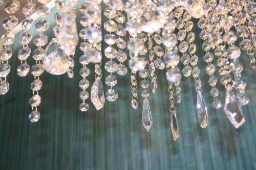 a close up of a chandelier with diamonds at Josefa D`Obidos Hotel in Óbidos
