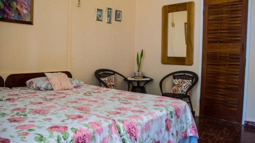Ein Bett oder Betten in einem Zimmer der Unterkunft House of Erabo
