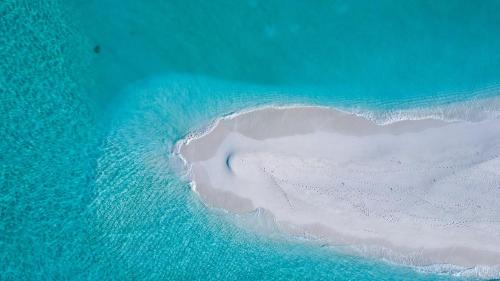 an aerial view of an island in the ocean at Ari Grand Hotel & Spa in Dhangethi