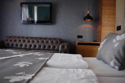 Ένα ή περισσότερα κρεβάτια σε δωμάτιο στο Hotel City View Deluxe