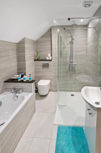 Ένα μπάνιο στο The Lodge - Studio Apartment's