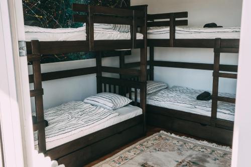 two sets of bunk beds in a room at Smart hostel in Belgrade