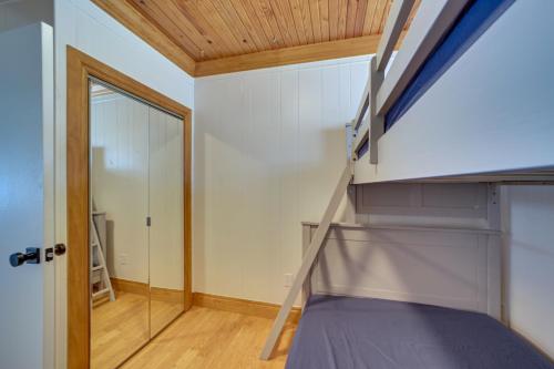 a room with a staircase and a glass door at Lakefront Eufaula Escape with Dock and Private Beach! in Eufaula