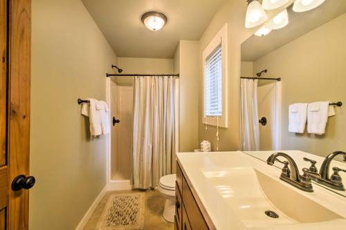 a bathroom with a sink and a toilet and a shower at Mountain View Boone Home Close to Blue Ridge Pkwy! in Blowing Rock
