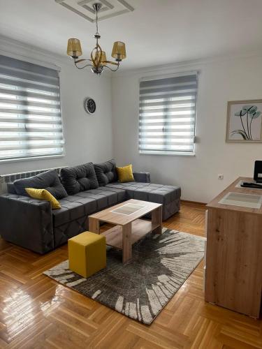 a living room with a couch and a coffee table at Port 2 in Belgrade