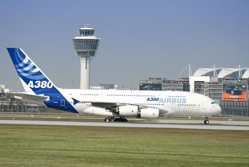 an airplane is sitting on the runway at an airport at AKZENT Hotel Aufkirchen in Aufkirchen