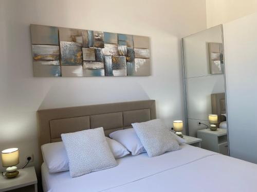 Ένα ή περισσότερα κρεβάτια σε δωμάτιο στο Apartmani Vera