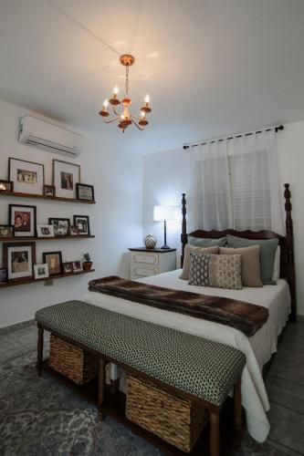 Ένα ή περισσότερα κρεβάτια σε δωμάτιο στο Hacienda Tres Casitas