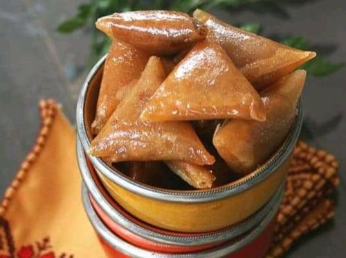 a small cup filled with food sitting on a table at GITE Take your time in Merzouga