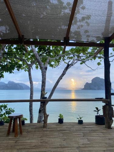 a view of the ocean from the deck of a house at CED Farm in El Nido