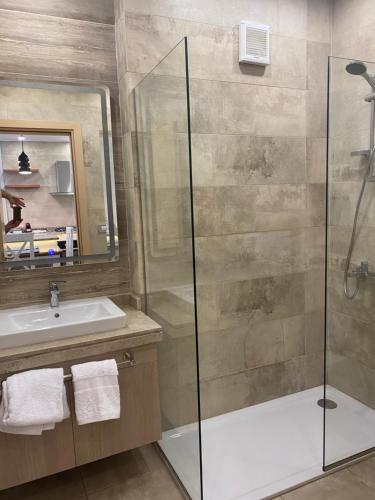 a bathroom with a shower and a sink at Il monte galala Sea view Chalet المونت جلاله in Ain Sokhna