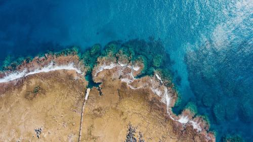 an aerial view of a beach and the ocean at White Grass Ocean Resort & Spa in Tanna Island