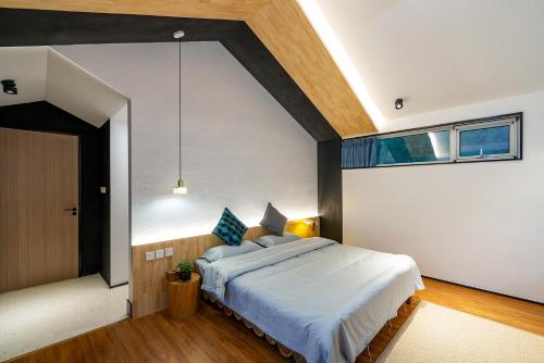 Postel nebo postele na pokoji v ubytování Starstay Wuling Mountain B&B