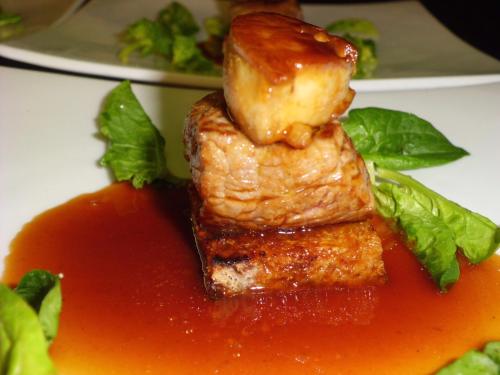 a piece of food on a plate with sauce at Villa Pitiana in Donnini