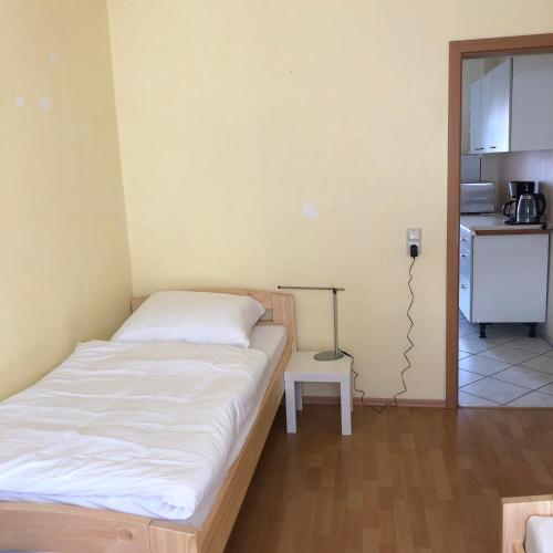 Vuode tai vuoteita majoituspaikassa Ferienwohnung Hohe Str.