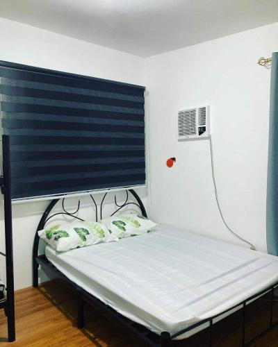 A bed or beds in a room at salty dog homestay