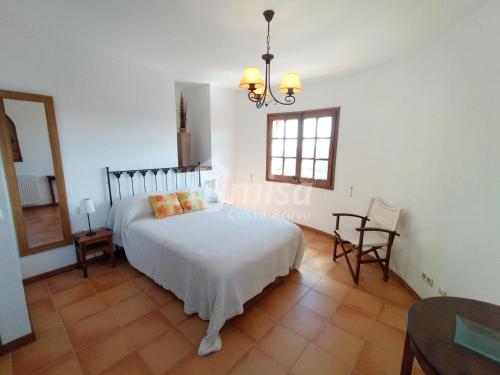 Ένα ή περισσότερα κρεβάτια σε δωμάτιο στο Casa Bellota