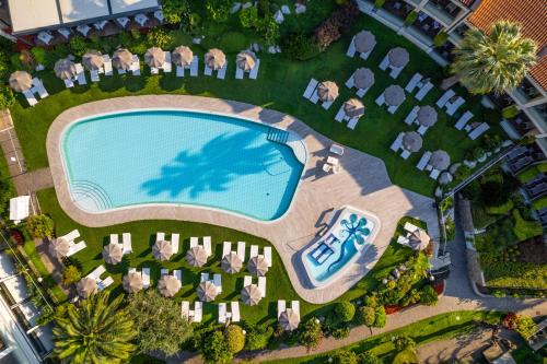 an overhead view of a pool at a resort at Park Hotel Imperial in Limone sul Garda