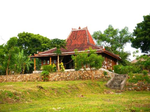 Zahrada ubytování RUMAH THEA